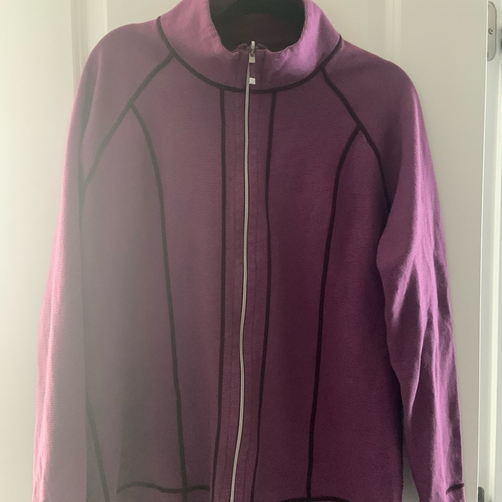 Reversible zip up sweatshirt. I believe it’s a size medium.